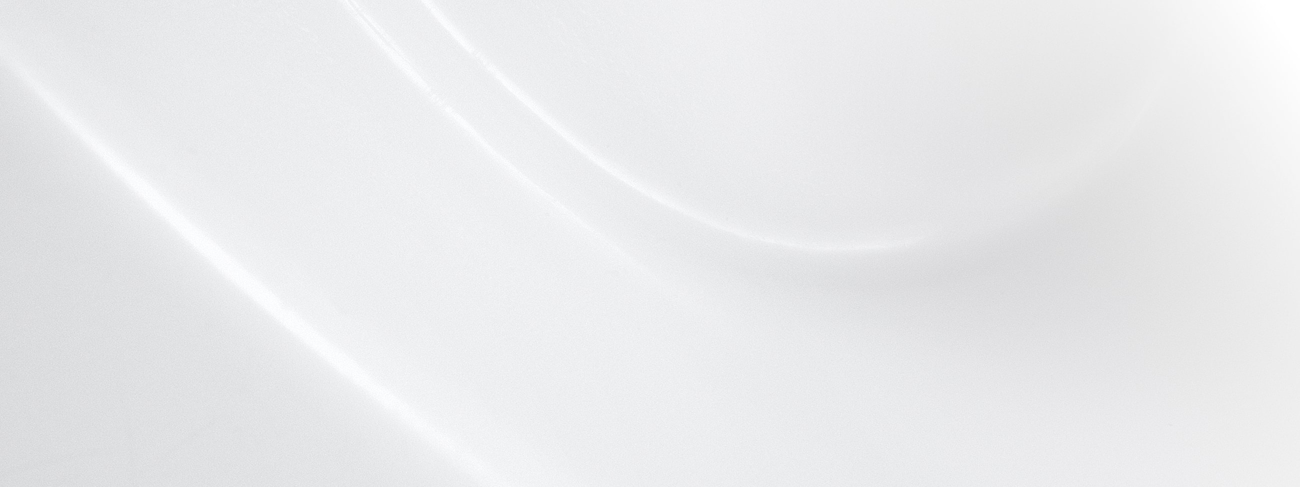 Abstract white surface with smooth curves.