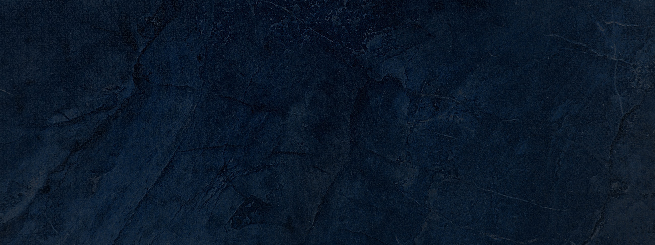Dark blue textured background image.