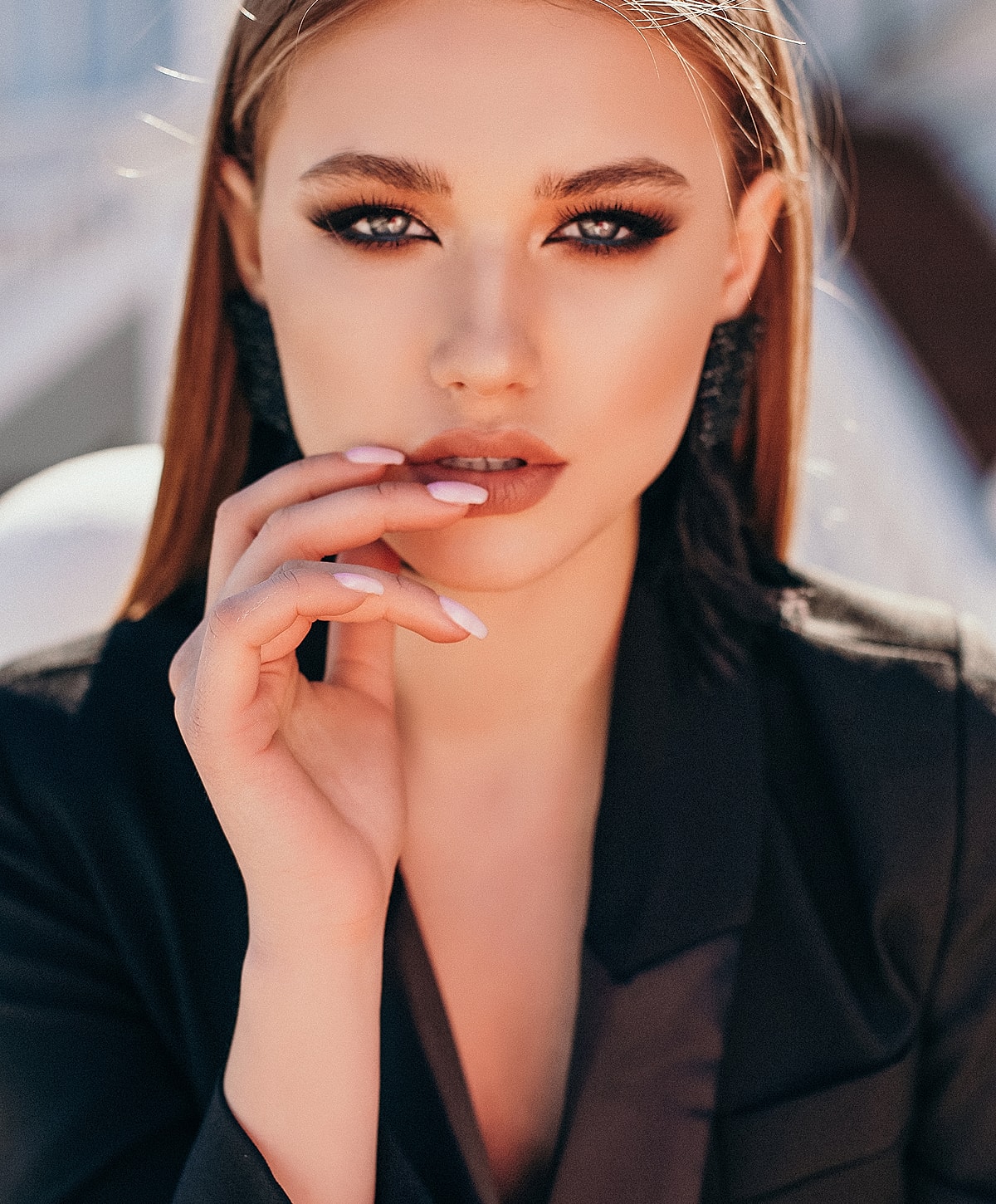 Portrait of a woman with striking makeup.